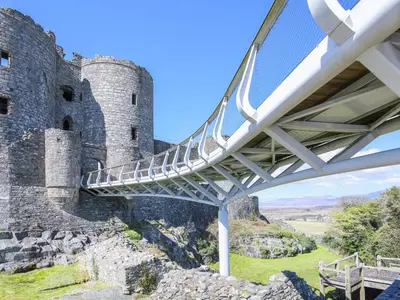 a bridge over the moat of a castle at Glyn Morfa in Harlech