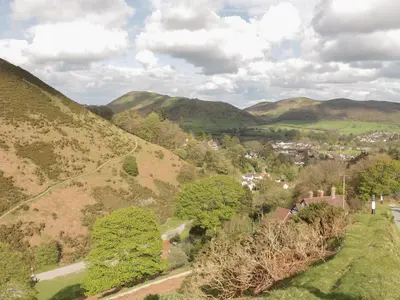 an aerial view of a small town in the hills at Minton Lane Cottage in Church Stretton