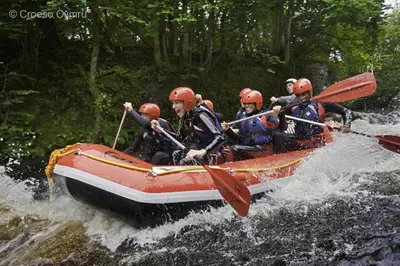 a group of people in a raft in the water at 5 Bed in Bala oc-bow163 in Bala