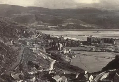 an old black and white photo of a town on a hill at Lovely Large home 10 Minute Walk to Barmouth Beach in Barmouth