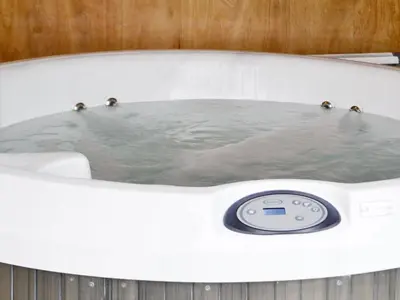 a bathtub filled with water with a thermometer in it at Ty Nant - Uk32239 in Lower Chapel