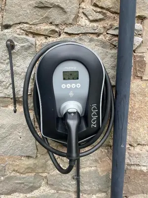 a device is hooked up to a stone wall at Little Underhill in Oswestry