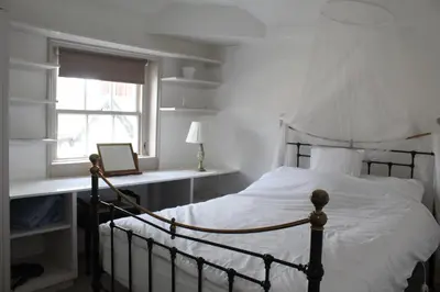 a bedroom with a bed and a window at 4BedHouse Leominster Hiking Castles Sleeps7 Wifi in Leominster