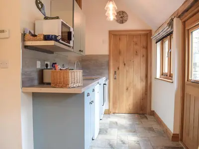 a kitchen with a sink and a counter top at Gooses Roost - Uk32096 in Dorstone