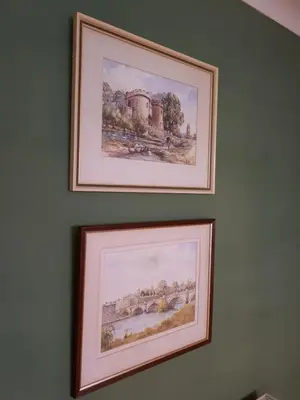 two pictures hanging on a wall at Afallon Townhouse in Dolgellau