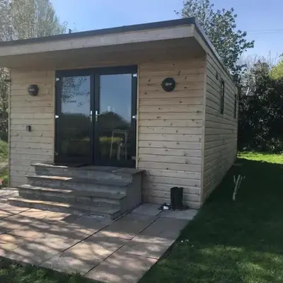 Secluded Log Cabin in beautiful private gardens