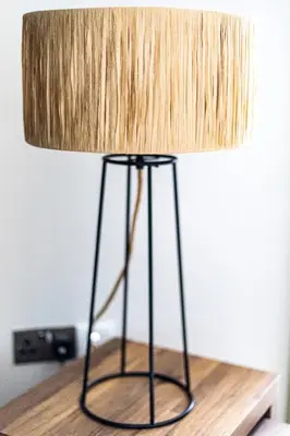a lamp sitting on top of a table at Ty Belgrave in Aberystwyth