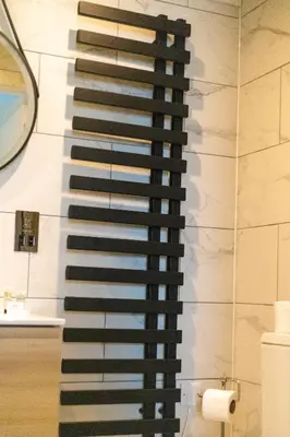 a rendering of a piano on a wall in a bathroom at Ty Belgrave - Apartment 2 in Aberystwyth