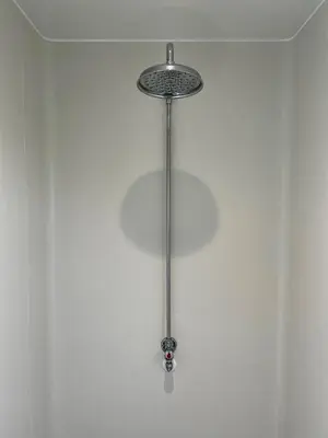 a light hanging from a ceiling in a room at Eastridge Glamping - Camping Pods in Shrewsbury