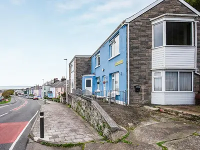 a blue house on the side of a street at Brig-Y-Don in Aberaeron
