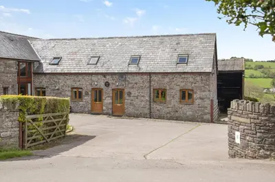 an external view of a stone building with a barn at 2 Bed in Cray oc-bow287 in Cray