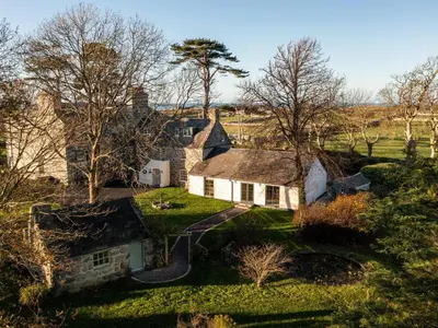 an aerial view of a house in a field at Bennar Fawr in Dyffryn