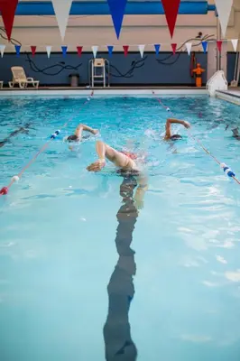 a group of people in a swimming pool at Aberystwyth University Bunkhouse in Aberystwyth