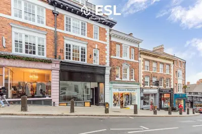 a group of buildings on a city street at Studio 2, Second Floor Town Centre Apartment in Shrewsbury