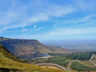 a view of a valley with a lake on a mountain at Ty Bach Twt - Uk36419 in Talybont