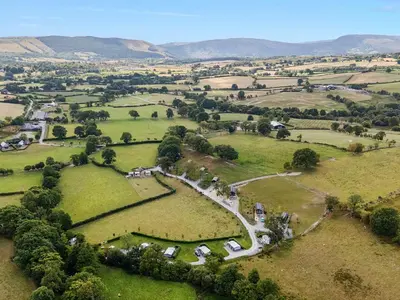 an aerial view of a field with tents in it at Oak Tree View in Rhayader