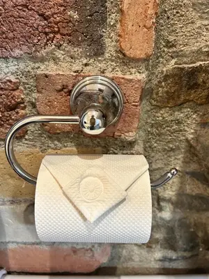 a white phone with a white envelope in a wall at Cadwgan House in Rhayader