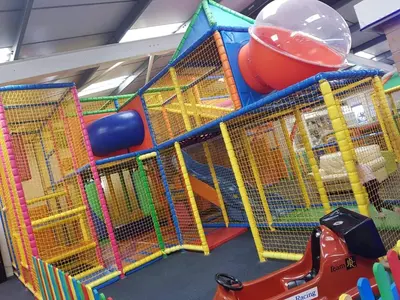 a play room with a playground with play equipment at C8 in Aberystwyth
