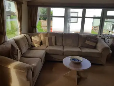 a living room with a couch and a table at C8 in Aberystwyth