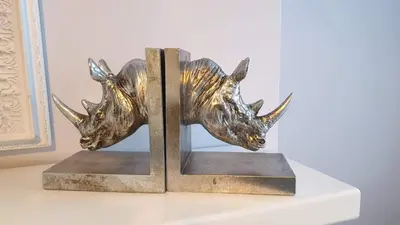 a bronze sculpture of two bulls on a table at Central cosy home 5 minutes walk from Shrewsbury - Pass the Keys in Shrewsbury