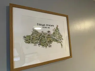 a framed picture of a map on a wall at Westend Holiday Let 4 Brecon in Brecon