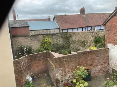an aerial view of an old brick wall at Rooftops - bijou sister apartment to Assembly View - free parking permit provided in Ludlow