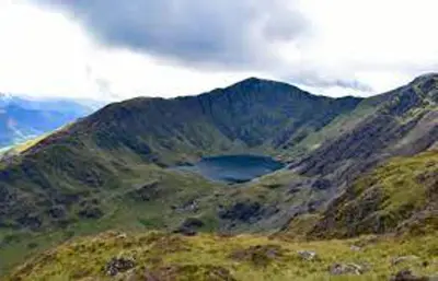 a view of a mountain with a lake in the middle at Apartment One Aberystwyth Town Centre in Aberystwyth