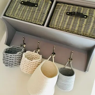 a drawer with three baskets and a drawer at The Art Attic a Stylish Boutique Apartment in Builth Wells