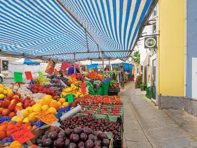 an outdoor market with fruits and vegetables on display at Bryn Araul in Rhydymain
