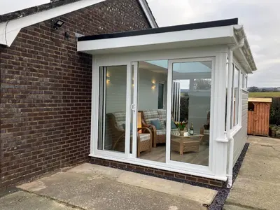an extension to a house with a conservatory at Berwyn View in Welshpool