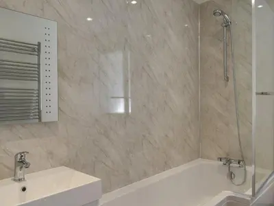 a bathroom with a tub and a sink and a shower at Bryn Y Felin in Dyffryn