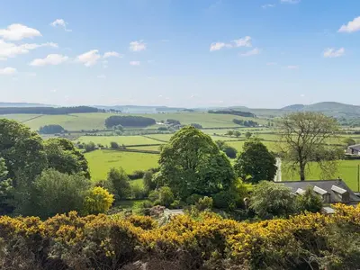 a view of the fields from the garden of a house at The Red House - Uk39234 in Minsterley
