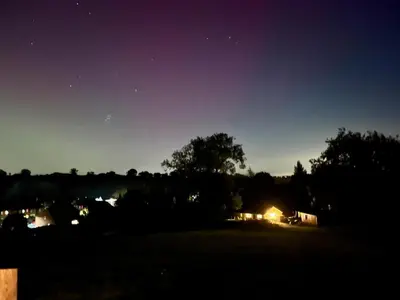 a night view of a house with the stars in the sky at 3 Bedroom Bungalow in Llanrhaeadr Ym in Oswestry