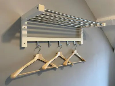 a rack of hangers in a room at The Bala House in Bala