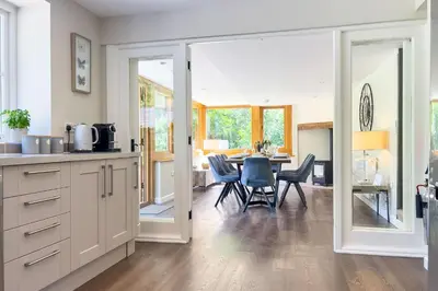 a kitchen and dining room with a table and chairs at Marrington Mill in Chirbury