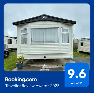 a trailer review awards with a picture of a caravan at Delightful 2 bedroom Caravan, Pencnwc, New Quay in Cross Inn