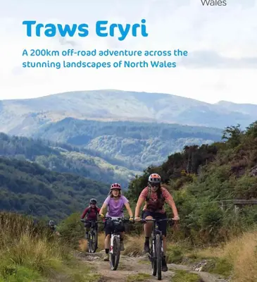 a group of people riding bikes on a mountain trail at Bryn Mair Gardens in Dolgellau