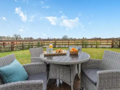 a table with a tray of fruit and a drink at Mouse Croft - Uk33954 in Llanymynech