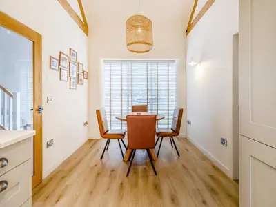 a dining room with a table and chairs at Pheasants Folly - Uk33955 in Llanymynech