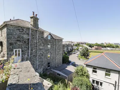 an aerial view of an old stone building at 4A Victoria Place in Barmouth