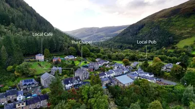 an aerial view of a small village in the mountains at Finest Retreats - Luxury Converted Chapel with Hot Tub & Games Room in Dinas Mawddwy