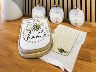 a cake with the words you are a home with bees on it at Tyglyn Cottage in Lampeter