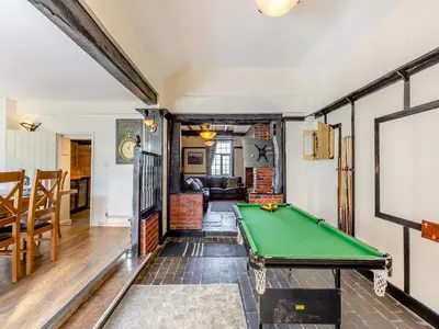 a living room with a pool table in it at The Cottage-Uk37339 in Montgomery