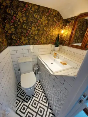 a bathroom with a toilet and a sink at 2 Bed in Aberaeron oc-bow329 in Aberaeron