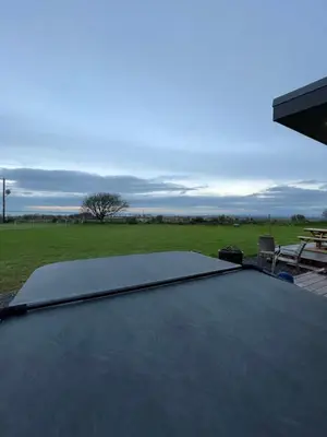 a skateboard ramp sitting on top of a patio at MAESLLAN CABINS - 'Golwg Y Mor' in Cross Inn