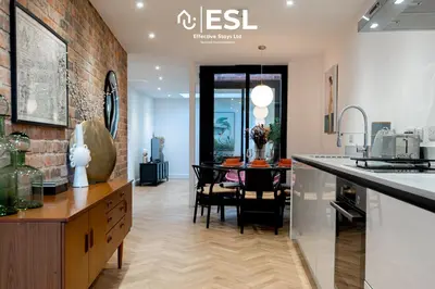 a kitchen and dining room with a dining table at Contemporary Townhouse - Free Parking - Central Shrewsbury in Shrewsbury