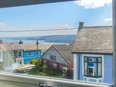 a view from a window of a house with buildings at Y Ty Glas - Cottage in New Quay
