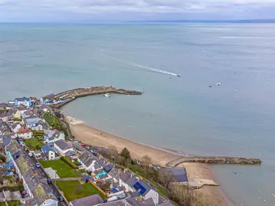 an aerial view of a beach and the ocean at Y Ty Glas - Cottage in New Quay