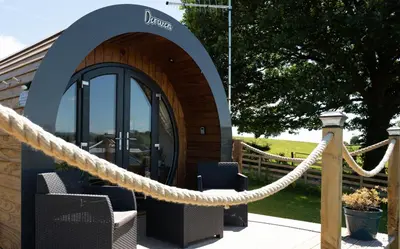 a rope leading to a cabin with a revolving door at Derwen in Welshpool