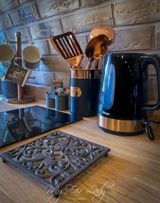 a kitchen counter with a tea kettle and utensils at The Prancing Pony in Llanrhaeadr-ym-Mochnant